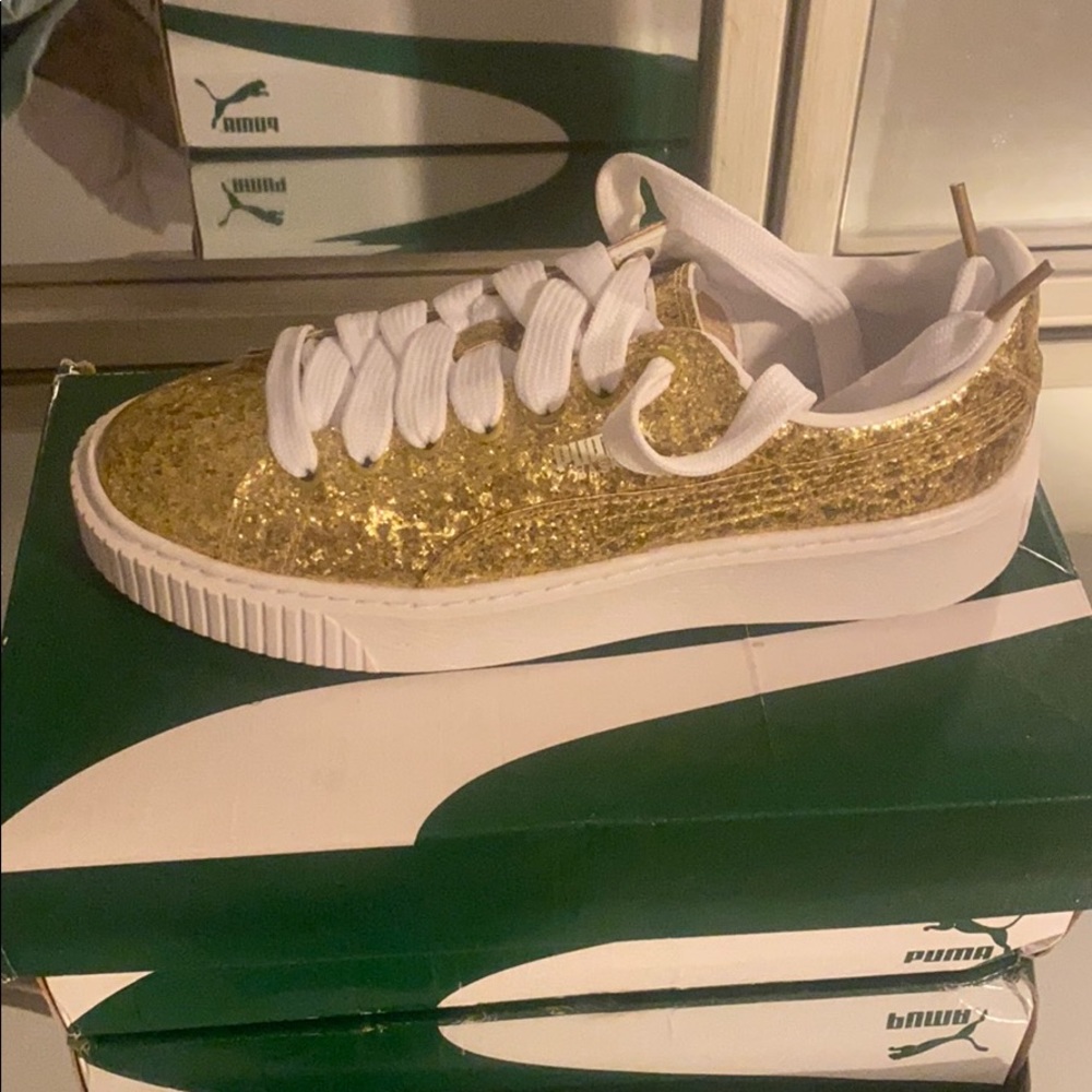 Puma Gold Glitter Platform Sneakers.